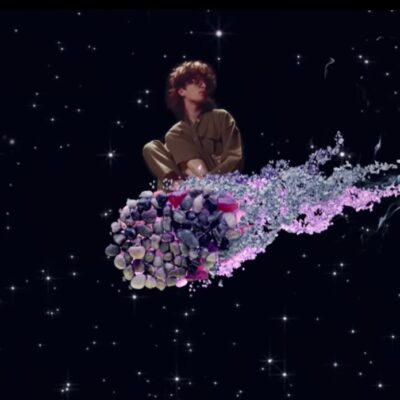 Cavetown looking like Nyancat flying across a starry sky