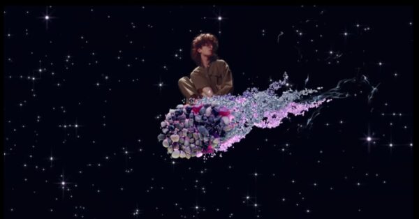 Cavetown looking like Nyancat flying across a starry sky