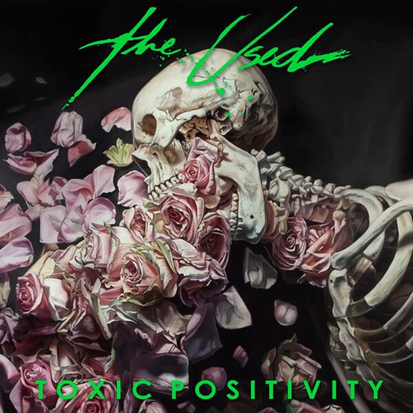 The Used - Toxic Positivity. A skull appears to be screaming a stream of pink-tinged roses
